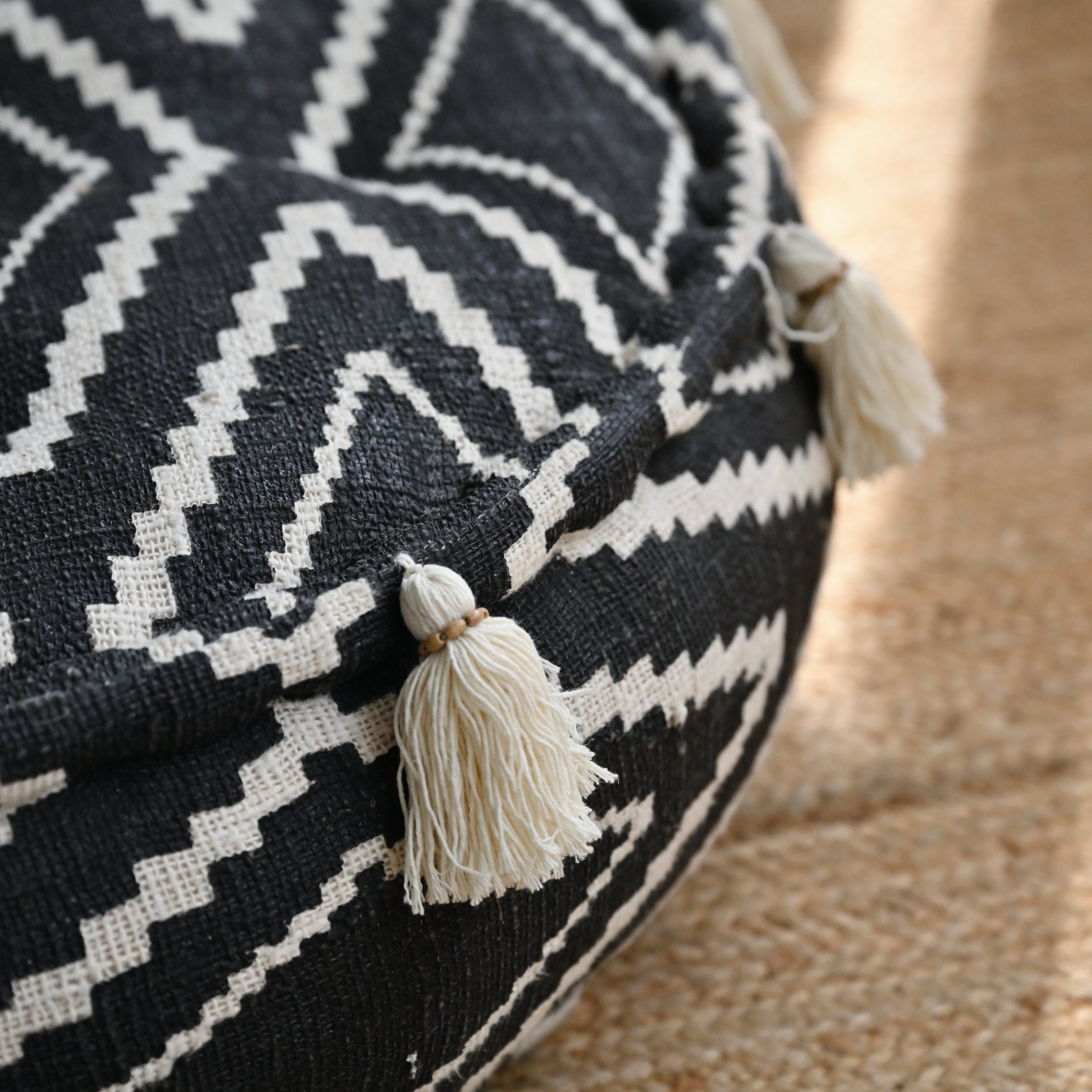 Round Raw Cotton Pouf with Tassels - Black