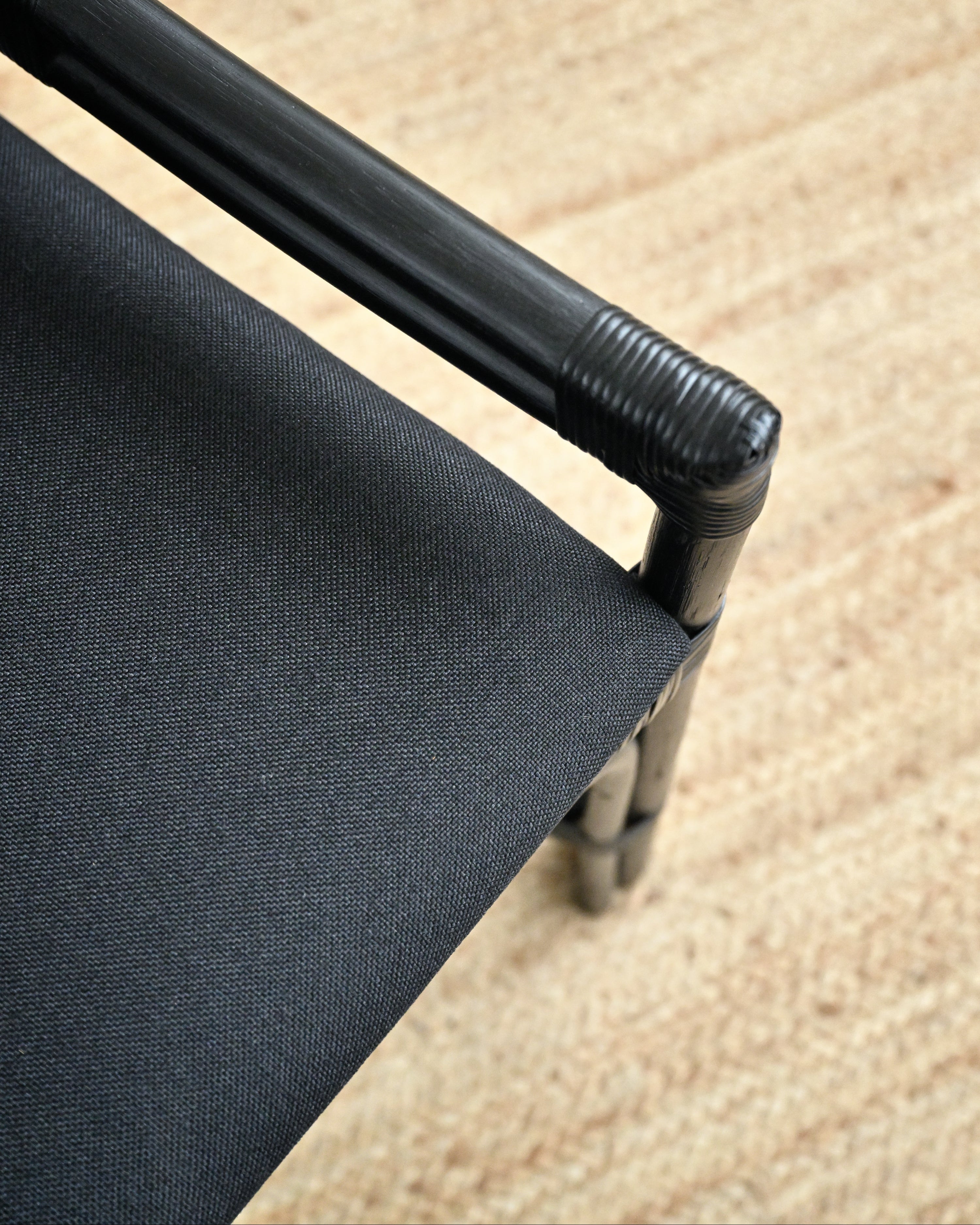 Black chair with a textured surface background