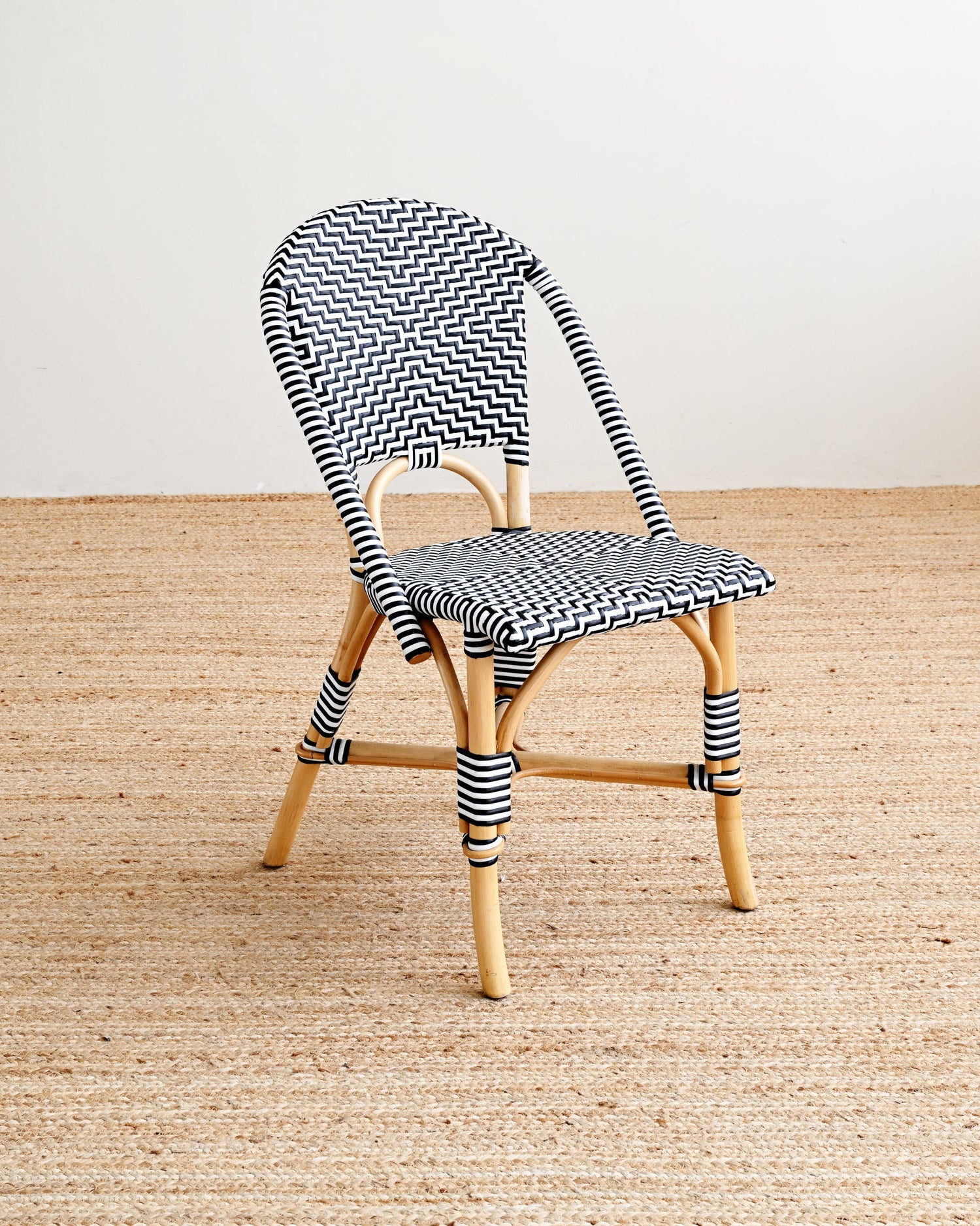 Chair with striped pattern on a wooden floor