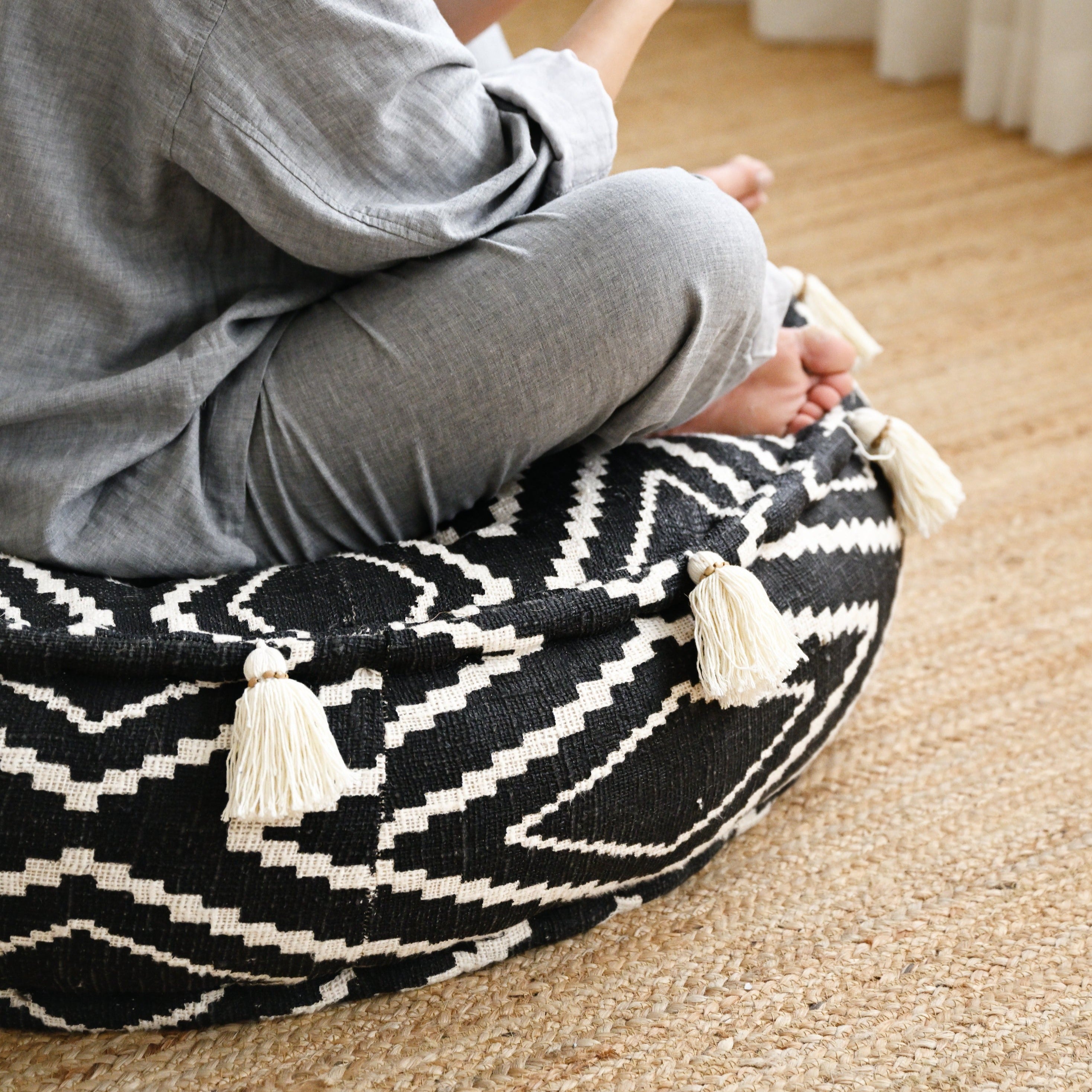 Round Raw Cotton Pouf with Tassels - Black