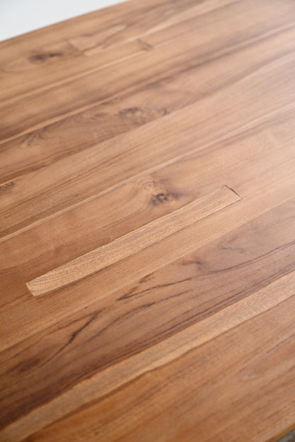 Close-up of a wooden surface with visible grain and texture