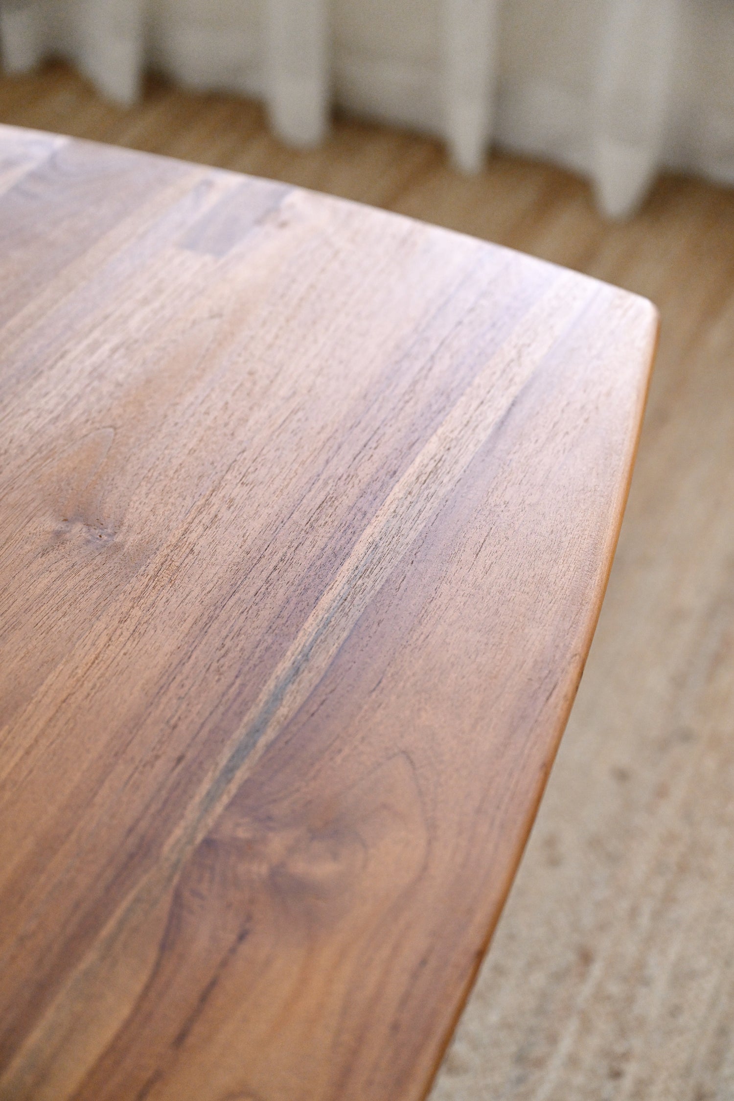 Close-up of a wooden surface with a blurred background