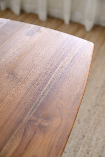Close-up of a wooden surface with a blurred background