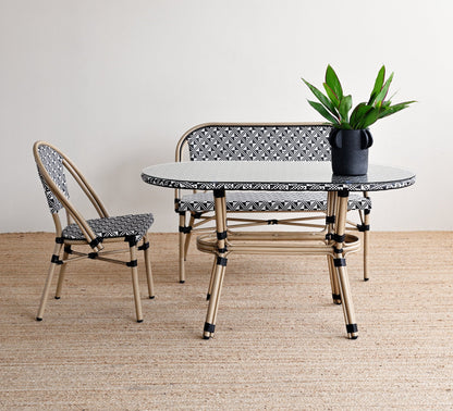 Modern outdoor furniture set with a table and two chairs on a wooden floor.
