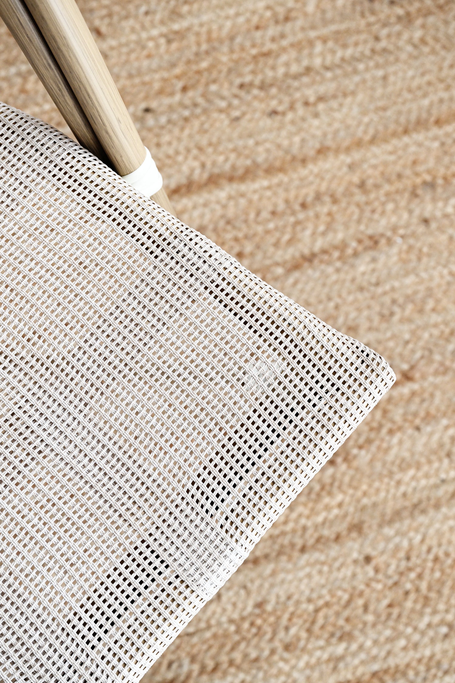 Close-up of a metal sifter on a wooden surface