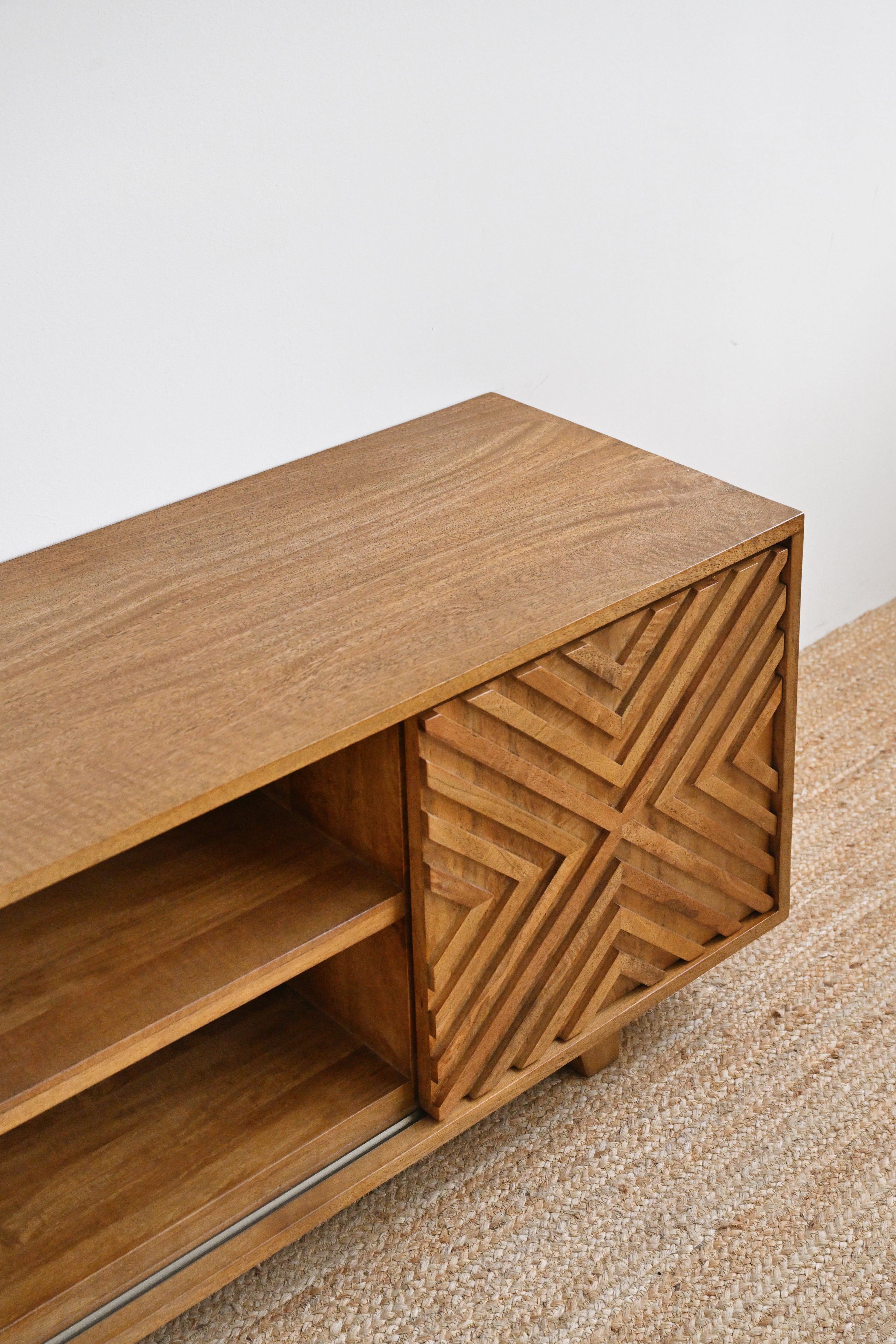 Wooden cabinet with geometric design on a neutral background