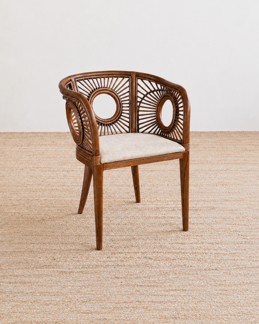 Wooden chair with a white cushion on a beige carpet