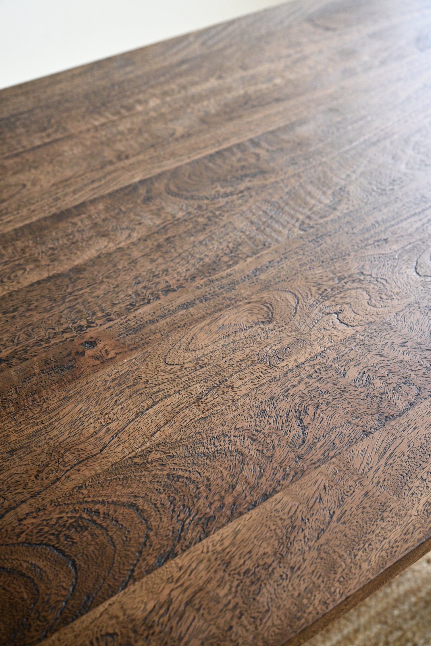 Close-up of a wooden surface with visible grain and texture