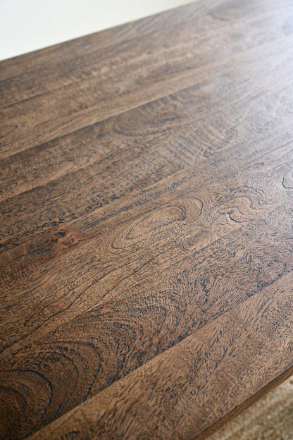 Close-up of a wooden surface with visible grain and texture