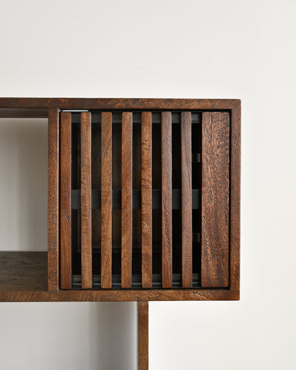 Wooden shelf with slatted design on a white background