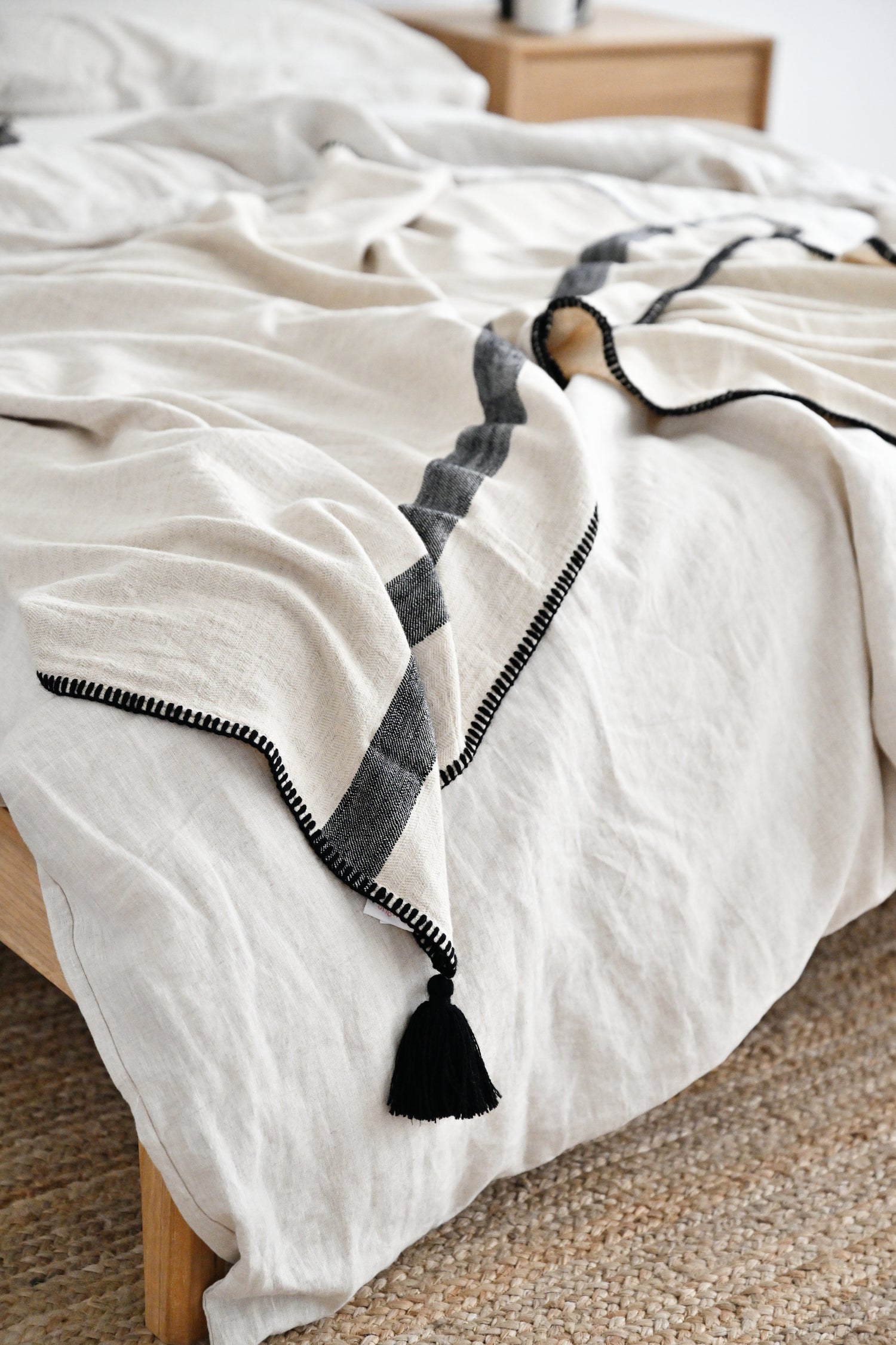 Pirene Throw with Handstitched Trim