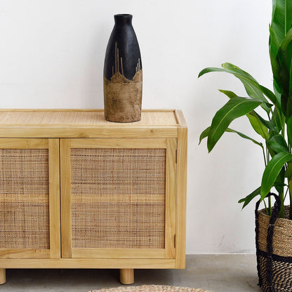 Black and Natural Vase on cabinet